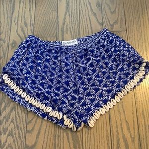 Blue pattern shorts w shells on bottom